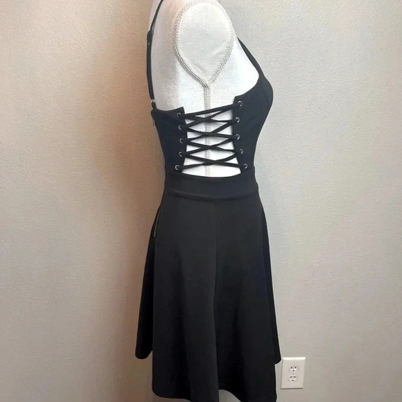 Dress with lace up detail on sides. Zipper in back. - Picture 5 of 12